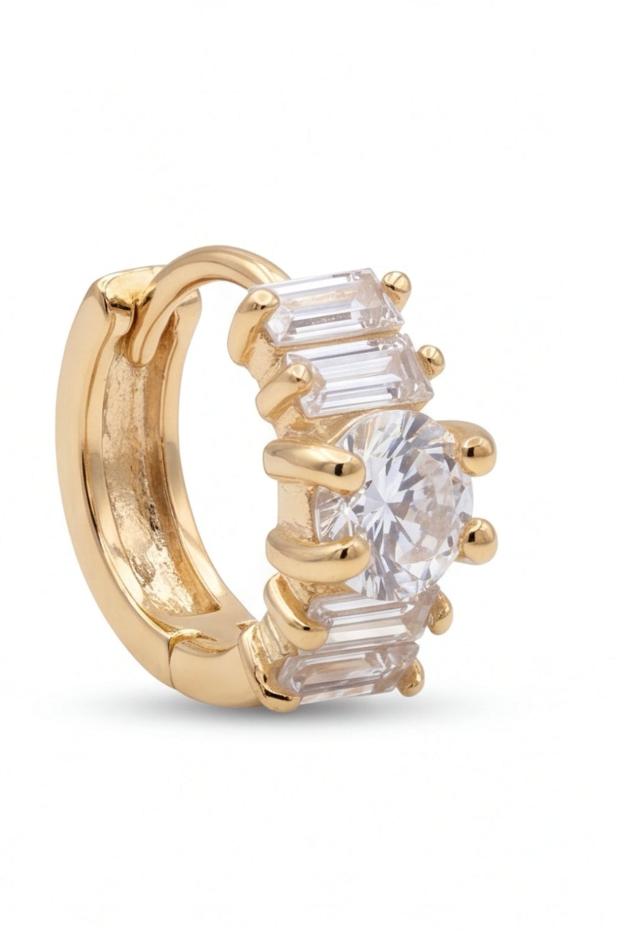 Gold hoop earrings with clear gemstones on a white background