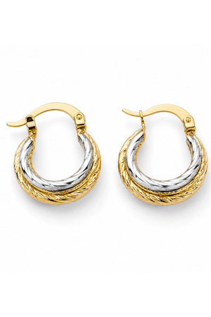 Pair of gold and silver hoop earrings on a white background