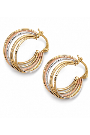 Gold and rose gold hoop earrings on a white background