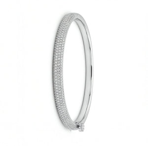 Silver bracelet with small diamonds on a white background