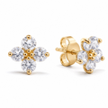 Gold and crystal flower-shaped earrings on a white background