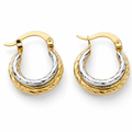 Pair of gold and silver hoop earrings on a white background