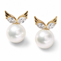 Pearl earrings with gold wing-like designs and clear gemstones on a white background